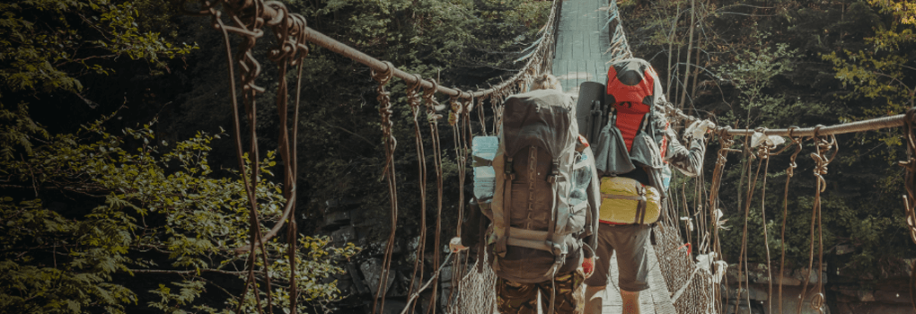 Footer banner with people traveling in jungle