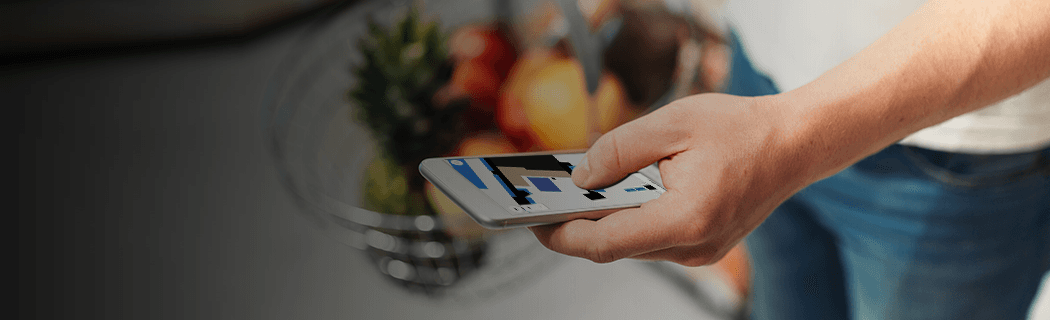 Footer banner with person shopping and navigating with mobile
