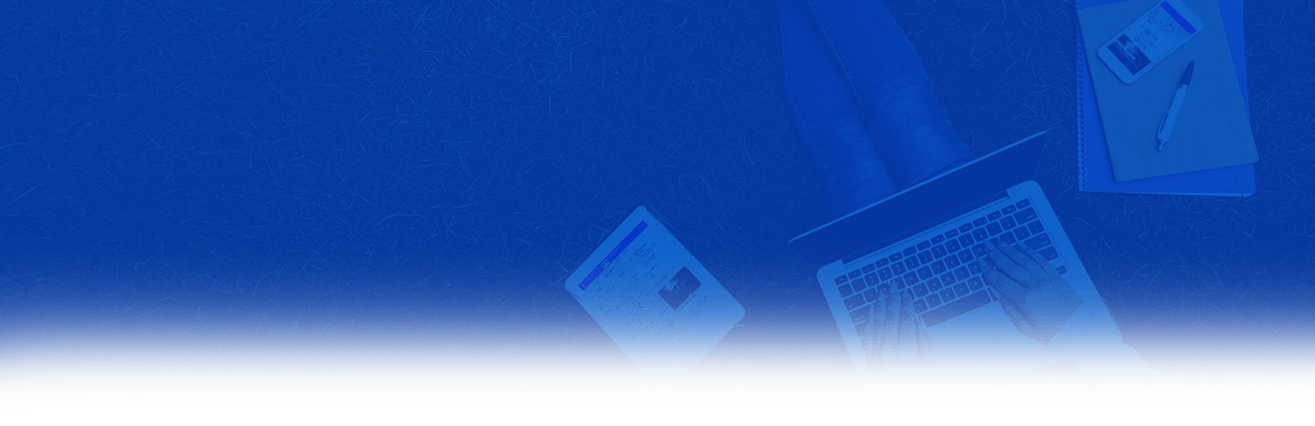 personne working with computer on grass